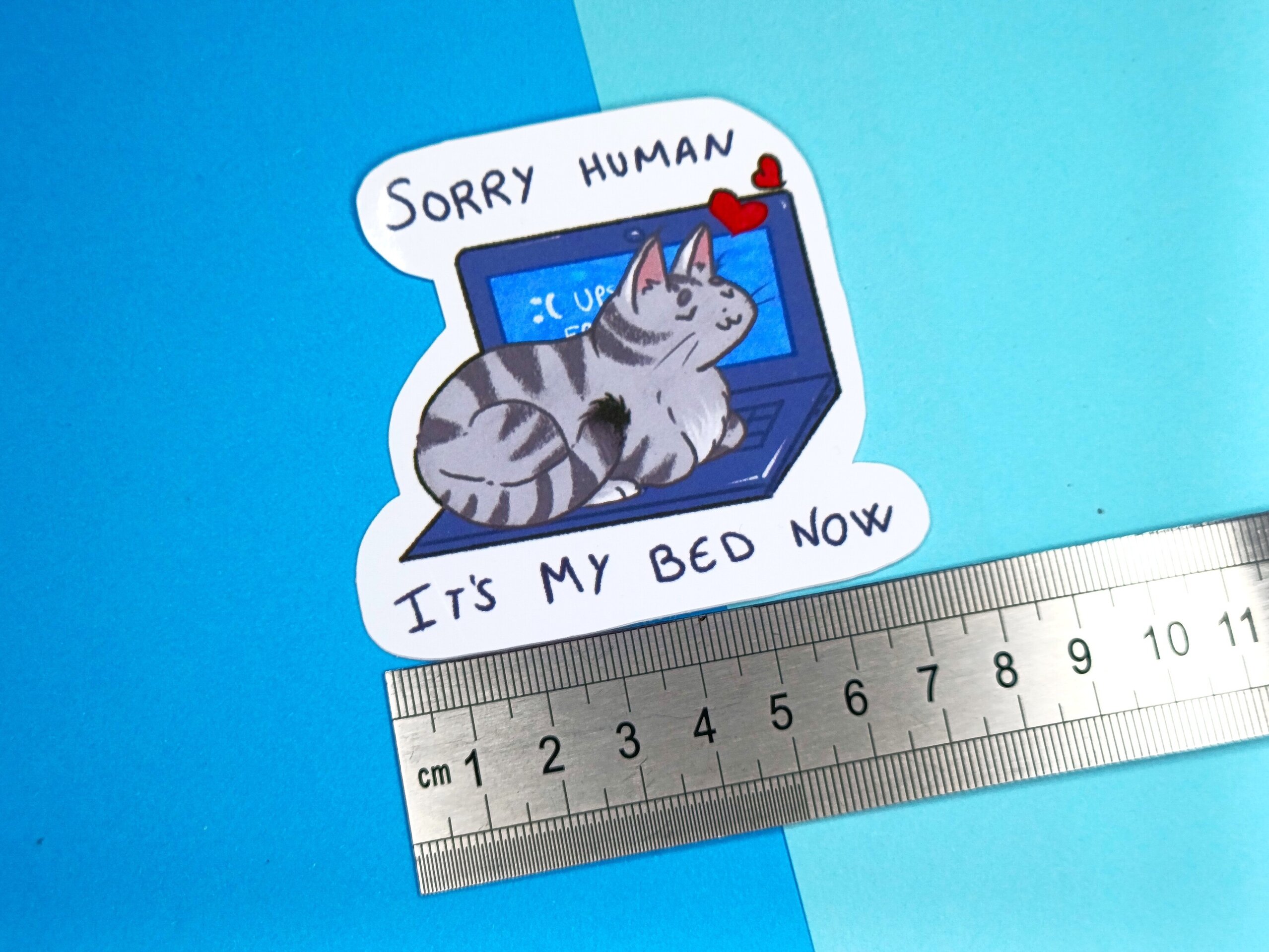 Pegatina de vinilo de gatito sobre un ordenador - 2